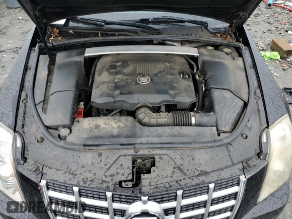 2014 Cadillac CTS Performance with VIN 1G6DC1E31E0159833, listed as a Copart auction lot 81323694 with 143,504 mi miles and Salvage title. Bid and sale history available at DreamBid. Image 11.