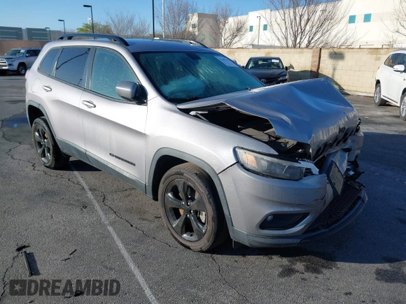 2020 Jeep Cherokee Latitude Plus with VIN 1C4PJLLB0LD500716, listed as a IAAI auction lot 41409010 with 97,848 mi miles. Bid and sale history available at carsss.com. Image 1.