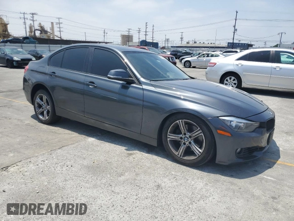 2015 BMW 3 Series 328i with VIN WBA3A5G5XFNS86943, listed as a Copart auction lot 57620325 with 154,165 mi miles and Salvage title. Bid and sale history available at DreamBid. Image 4.