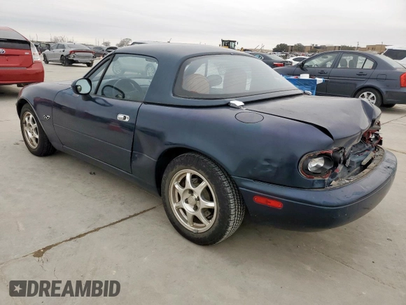 1994 Mazda MX-5 Miata with VIN JM1NA3537R0512679, listed as a Copart auction lot 45649075 with 126,476 mi miles and Salvage title. Bid and sale history available at DreamBid. Image 2.