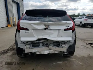 2019 Cadillac XT4 FWD Premium Luxury with VIN 1GYFZCR43KF151044, listed as a Copart auction lot 57912915 with 71,138 mi miles and Salvage title. Bid and sale history available at DreamBid. Image 6.