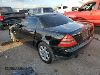 1999 Mercedes-Benz SLK-Class with VIN WDBKK47F1XF124854, listed as a Copart auction lot 73160604 with 55,730 mi miles and Salvage Title. Bid and sale history available at carsss.com. Image 2.