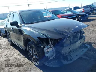 2018 Mazda CX-5 Grand Touring with VIN JM3KFBDM5J0441518, listed as a IAAI auction lot 41748941 with 64,639 mi miles. Bid and sale history available at carsss.com. Image 1.