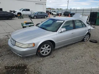 2003 Cadillac Seville Luxury SLS z VIN 1G6KS54Y53U262581, wystawiony jako Copart lot #55597595 z przebiegiem 80 832 mil mil oraz Szkody całkowita. Historia ofert i sprzedaży dostępna na DreamBid. Obrazek 1.