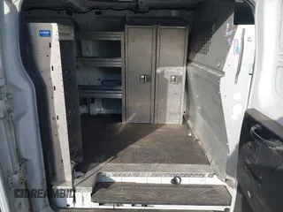 2015 Ford Transit Cargo with VIN 1FTNE1ZM6FKA63779, listed as a IAAI auction lot 41367212 with 208,866 mi miles and . Bid and sale history available at carsss.com. Image 8.