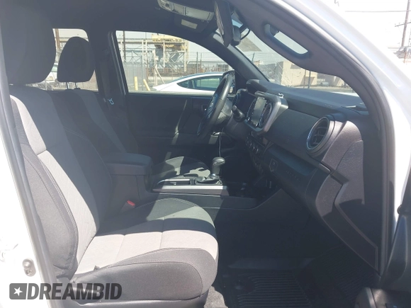 2023 Toyota Tacoma SR5 z VIN 3TMDZ5BN3PM160975, wystawiony jako IAAI lot #42024778 z przebiegiem 41 621 mil mil oraz . Historia ofert i sprzedaży dostępna na DreamBid. Obrazek 5.