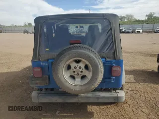 2003 Jeep Wrangler Sport z VIN 1J4FA49S53P350281, wystawiony jako Copart lot #56634005 z przebiegiem 158 974 mil mil oraz Szkoda całkowita • Salvage title. Historia ofert i sprzedaży dostępna na DreamBid. Obrazek 6.