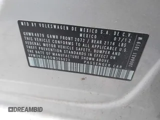 2013 Volkswagen Jetta S with VIN 3VW2K7AJ5DM355023, listed as a IAAI auction lot 42009198 with Not provided miles and . Bid and sale history available at DreamBid. Image 9.
