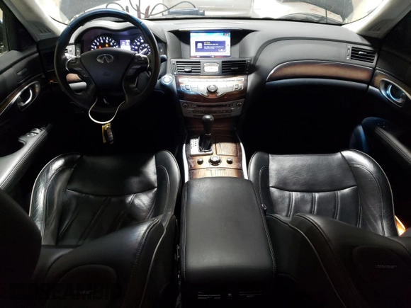 2012 Infiniti M Hybrid with VIN JN1EY1AP7CM910194, listed as a Copart auction lot 72003524 with 124,723 mi miles and Salvage title. Bid and sale history available at DreamBid. Image 8.