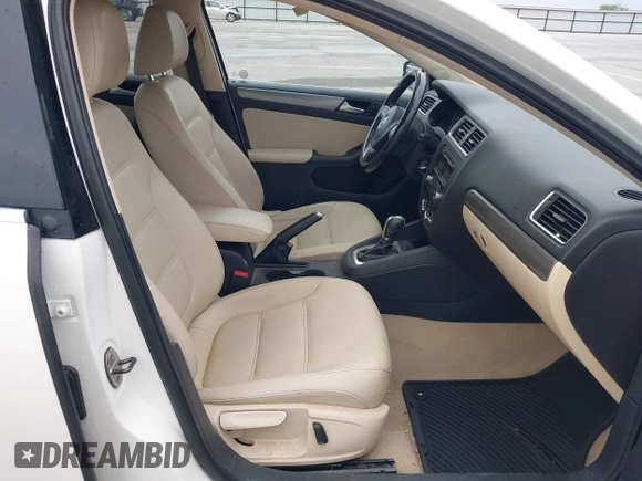 2014 Volkswagen Jetta TDI w/Premium with VIN 3VWLL7AJXEM372547, listed as a IAAI auction lot 42320105 with 113,200 mi miles and . Bid and sale history available at DreamBid. Image 5.