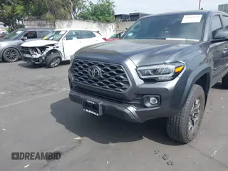 2023 Toyota Tacoma SR with VIN 3TMCZ5AN0PM635933, listed as a IAAI auction lot 42543126 with 32,960 mi miles and . Bid and sale history available at DreamBid. Image 13.