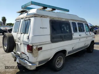 1994 GMC Vandura z VIN 1GDEG25KXRF519134, wystawiony jako Copart lot #75056124 z przebiegiem 245 597 mil mil oraz Szkody całkowita. Historia ofert i sprzedaży dostępna na DreamBid. Obrazek 3.
