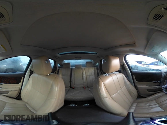 2014 Jaguar XJ with VIN SAJWA1CZXE8V74400, listed as a IAAI auction lot 38250698 with 102,205 mi miles and . Bid and sale history available at DreamBid. Image 19.