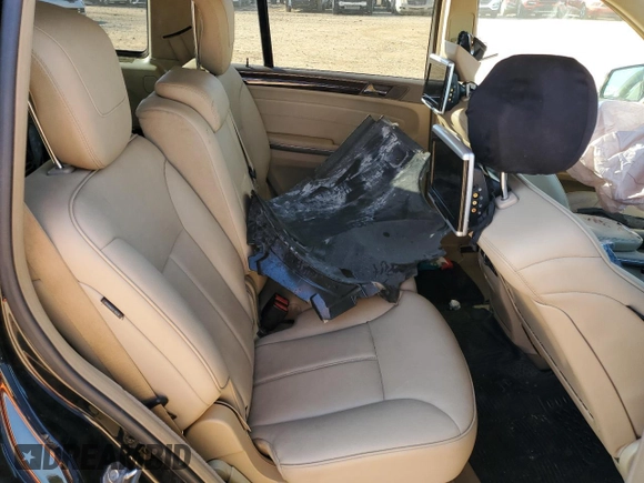2012 Mercedes-Benz GL 450 z VIN 4JGBF7BE7CA775592, wystawiony jako Copart lot #46651905 z przebiegiem 142 092 mil mil oraz Szkoda całkowita • Salvage title. Historia ofert i sprzedaży dostępna na DreamBid. Obrazek 11.