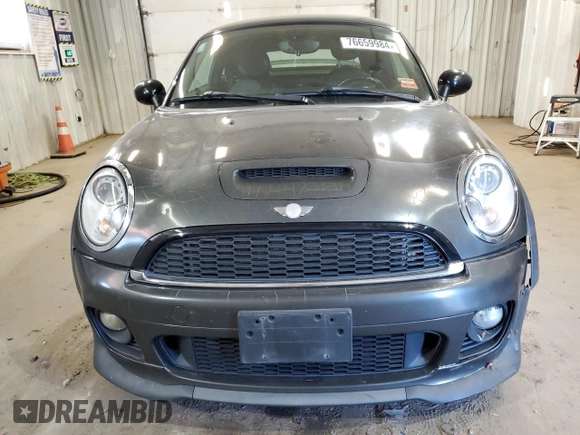 2012 MINI Coupe S z VIN WMWSX3C50CT154835, wystawiony jako Copart lot #76659984 z przebiegiem 122 425 mil mil oraz Szkoda całkowita • Salvage title. Historia ofert i sprzedaży dostępna na DreamBid. Obrazek 5.