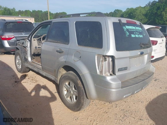 2009 Ford Escape XLT with VIN 1FMCU93G29KC41151, listed as a IAAI auction lot 42078509 with 238,350 mi miles. Bid and sale history available at carsss.com. Image 3.