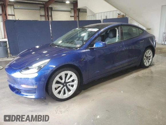2022 Tesla Model 3 with VIN 5YJ3E1EA7NF369551, listed as a Copart auction lot 55610805 with 128,311 mi miles and Clean Title. Bid and sale history available at DreamBid. Image 1.