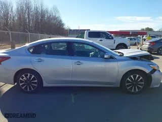 2018 Nissan Altima 2.5 SV with VIN 1N4AL3AP9JC158108, listed as a IAAI auction lot 41464382 with 123,129 mi miles. Bid and sale history available at carsss.com. Image 13.