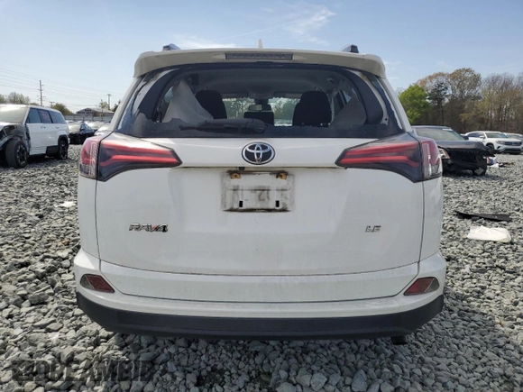 2018 Toyota RAV4 LE with VIN JTMZFREV1JJ209984, listed as a Copart auction lot 51187165 with 101,750 mi miles and Salvage Title. Bid and sale history available at carsss.com. Image 6.