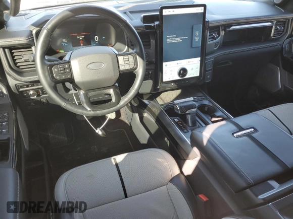 2023 Ford F-150 Lightning Pro z VIN 1FT6W1EV3PWG03292, wystawiony jako Copart lot #48454435 z przebiegiem 41 714 mil mil oraz Tytuł czysty. Historia ofert i sprzedaży dostępna na DreamBid. Obrazek 8.