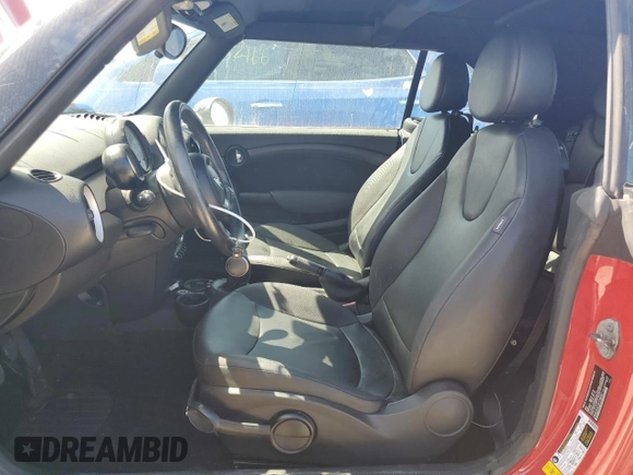 2015 MINI Convertible с VIN WMWZN3C53FT266957, выставлен на аукционе Copart как лот 74564094 с пробегом Не указан миль и На запчасти • Non repairable. История ставок и продаж доступна на DreamBid. Изображение 7.