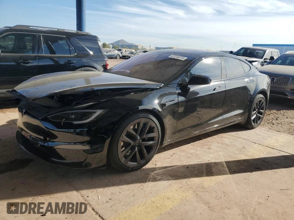2022 Tesla Model S z VIN 5YJSA1E51NF474743, wystawiony jako Copart lot #87316374 z przebiegiem Nie podano mil oraz Szkoda całkowita • Salvage title. Historia ofert i sprzedaży dostępna na DreamBid. Obrazek 1.