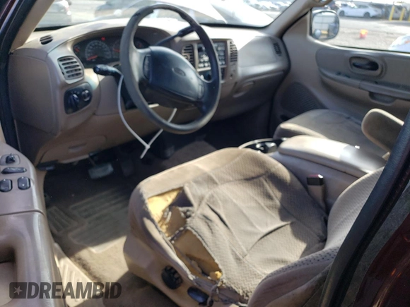 2000 Ford F-150 with VIN 1FTRX17W5YKA50203, listed as a Copart auction lot 54734615 with Not Provided miles and Salvage Title. Bid and sale history available at DreamBid. Image 8.