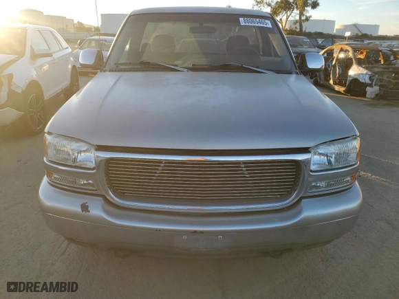 1999 GMC New Sierra 1500 SLE with VIN 1GTEC14T1XZ519751, listed as a Copart auction lot 88065465 with 195,547 mi miles and Salvage Title. Bid and sale history available at carsss.com. Image 5.