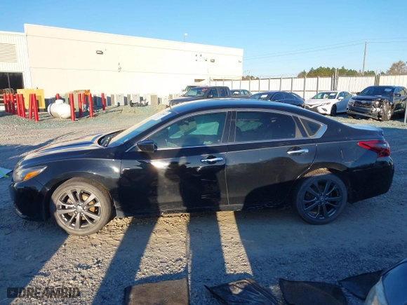 2018 Nissan Altima 2.5 SV with VIN 1N4AL3AP0JC206319, listed as a IAAI auction lot 41296685 with 96,103 mi miles. Bid and sale history available at carsss.com. Image 15.