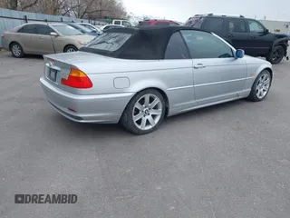 2001 BMW 3 Series 325Ci with VIN WBABS33461JY41669, listed as a IAAI auction lot 41805532 with 139,800 mi miles. Bid and sale history available at carsss.com. Image 4.