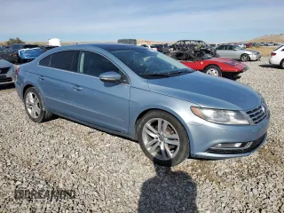 2013 Volkswagen CC Lux with VIN WVWRP7AN5DE525411, listed as a Copart auction lot 77148844 with 117,652 mi miles and Salvage Title. Bid and sale history available at carsss.com. Image 4.
