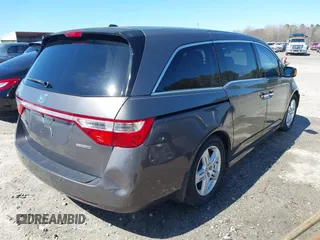 2012 Honda Odyssey Touring with VIN 5FNRL5H91CB057344, listed as a IAAI auction lot 41835272 with 158,854 mi miles. Bid and sale history available at carsss.com. Image 4.