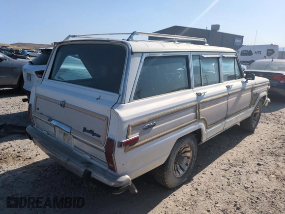 1987 Jeep Grand Wagoneer с VIN 1JCNJ15UXHT013691, выставлен на аукционе Copart как лот 59439595 с пробегом 174 941 миль миль и Чистый • Clean title. История ставок и продаж доступна на DreamBid. Изображение 3.