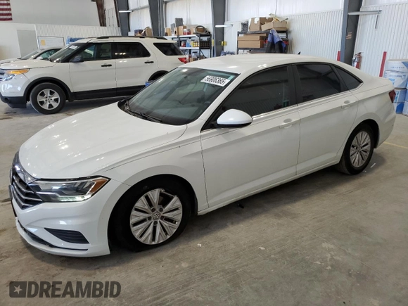 2019 Volkswagen Jetta S с VIN 3VWC57BU8KM276012, выставлен на аукционе Copart как лот 56906365 с пробегом 127 017 миль миль и Списание • Salvage title. История ставок и продаж доступна на DreamBid. Изображение 1.