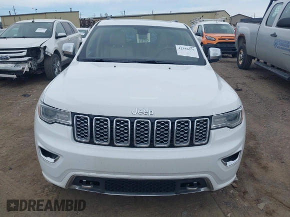 2017 Jeep Grand Cherokee Overland with VIN 1C4RJFCG6HC941771, listed as a IAAI auction lot 42356577 with 192,318 mi miles and . Bid and sale history available at DreamBid. Image 12.