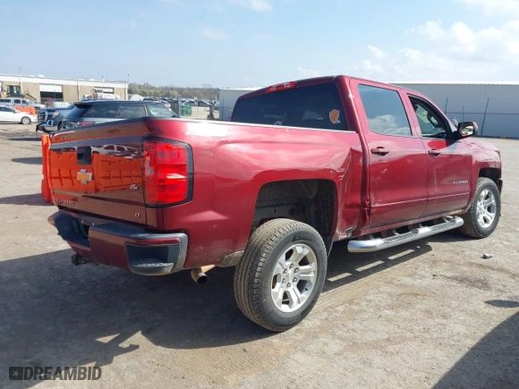 2016 Chevrolet Silverado 1500 LT with VIN 3GCUKREC0GG354271, listed as a IAAI auction lot 38948207 with 130,369 mi miles. Bid and sale history available at carsss.com. Image 4.