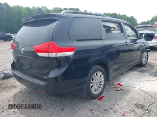 2011 Toyota Sienna XLE AAS with VIN 5TDYK3DC3BS103531, listed as a IAAI auction lot 42290142 with 231,995 mi miles and . Bid and sale history available at DreamBid. Image 4.