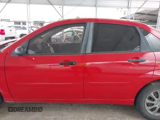 2007 Ford Focus S z VIN 1FAFP34N07W282022, wystawiony jako IAAI lot #42126281 z przebiegiem Nie podano mil oraz . Historia ofert i sprzedaży dostępna na DreamBid. Obrazek 14.