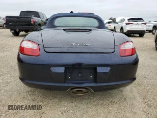 2005 Porsche Boxster с VIN WP0CA29875U713041, выставлен на аукционе Copart как лот 74948004 с пробегом Не указан миль и Списание • Salvage title. История ставок и продаж доступна на DreamBid. Изображение 6.