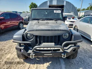 2008 Jeep Wrangler Unlimited Sahara with VIN 1J8GA59158L538460, listed as a Copart auction lot 63897295 with 335,852 mi miles and Clean title. Bid and sale history available at DreamBid. Image 5.