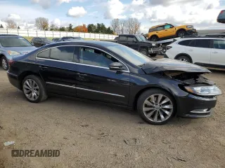 2013 Volkswagen CC VR6 Executive 4Motion with VIN WVWGU7AN1DE550824, listed as a Copart auction lot 77453544 with 0 mi miles and Salvage Title. Bid and sale history available at carsss.com. Image 4.