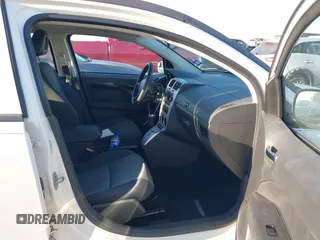 2008 Dodge Caliber SXT with VIN 1B3HB48B38D668777, listed as a IAAI auction lot 41202480 with 156,790 mi miles and . Bid and sale history available at DreamBid. Image 5.