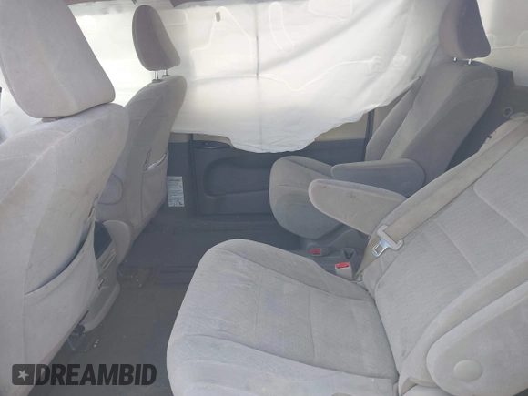 2015 Toyota Sienna LE AAS with VIN 5TDKK3DC2FS590667, listed as a IAAI auction lot 41997673 with 169,828 mi miles. Bid and sale history available at carsss.com. Image 8.