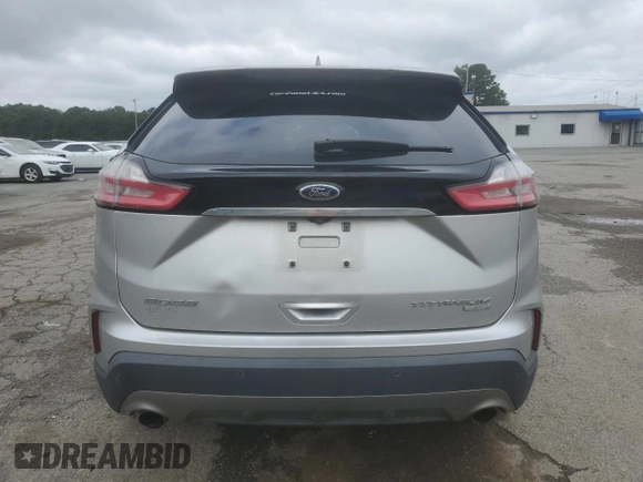 2019 Ford Edge Titanium с VIN 2FMPK3K95KBB22694, выставлен на аукционе Copart как лот 58660475 с пробегом 144 615 миль миль и Списание • Salvage title. История ставок и продаж доступна на DreamBid. Изображение 6.