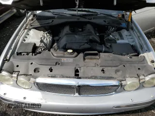 2006 Jaguar XJ Vanden Plas z VIN SAJWA82B46SG49807, wystawiony jako Copart lot #58930685 z przebiegiem 116 710 mil mil oraz Szkoda całkowita • Salvage title. Historia ofert i sprzedaży dostępna na DreamBid. Obrazek 11.