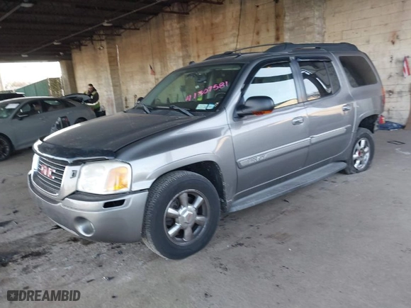 2005 GMC Envoy XL SLT with VIN 1GKET16S556177504, listed as a IAAI auction lot 41307581 with 131,102 mi miles. Bid and sale history available at carsss.com. Image 2.