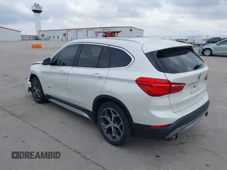 2016 BMW X1 xDrive28i with VIN WBXHT3C35GP886144, listed as a IAAI auction lot 41954742 with 89,268 mi miles. Bid and sale history available at carsss.com. Image 3.
