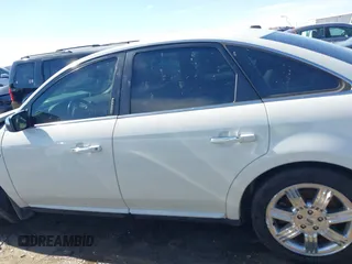 2009 Ford Taurus Limited z VIN 1FAHP25W79G100758, wystawiony jako IAAI lot #41666518 z przebiegiem 144 098 mil mil oraz . Historia ofert i sprzedaży dostępna na DreamBid. Obrazek 14.