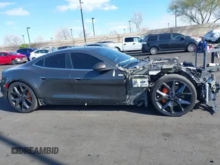 2018 Karma Revero z VIN 50GK41SA4JA000249, wystawiony jako IAAI lot #41865477 z przebiegiem 104 010 mil mil oraz . Historia ofert i sprzedaży dostępna na DreamBid. Obrazek 13.