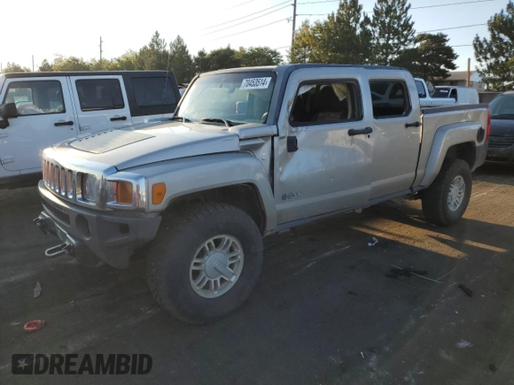 2009 Hummer H3 with VIN 5GNEN13E698128049, listed as a Copart auction lot 70453514 with 154,567 mi miles and Salvage Title. Bid and sale history available at DreamBid. Image 1.